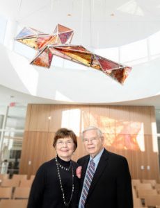 Evangeline “Vangie” and Norm Hagfors pictured together in the Gundale Chapel in the Hagfors Center for Science, Business, and Religion on Augsburg’s campus.